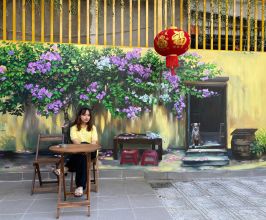 Vẽ tranh tường vàng hoa giấy cho không gian quán trà sữa
